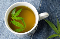Marijuana herbal tea with cannabis leaves