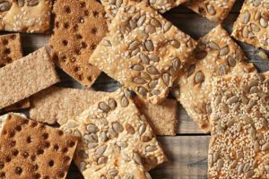 Assortment of cannabis-infused crackers on table